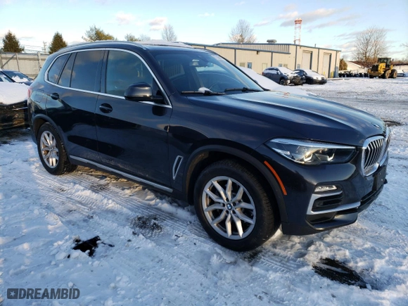 2021 BMW X5 xDrive40i with VIN 5UXCR6C06M9H35683, listed as a Copart auction lot 87386054 with 33,331 mi miles and Salvage Title. Bid and sale history available at carsss.com. Image 4.