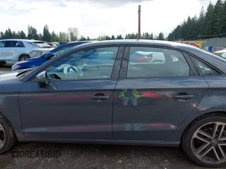 2017 Audi A3 Premium z VIN WAUAUGFF6H1044150, wystawiony jako IAAI lot #42002615 z przebiegiem 60 371 mil mil oraz . Historia ofert i sprzedaży dostępna na DreamBid. Obrazek 15.