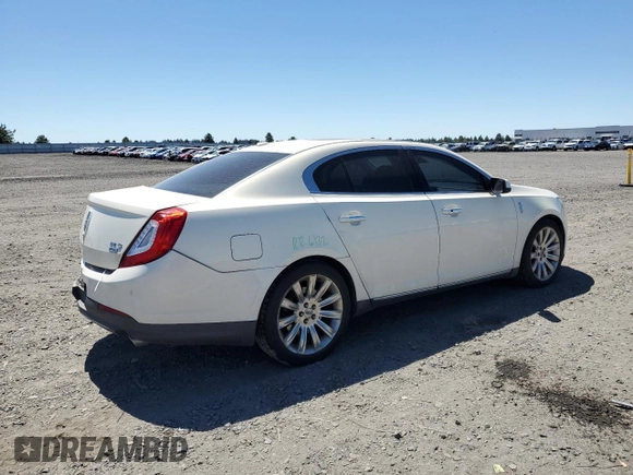 2013 Lincoln MKS с VIN 1LNHL9EK8DG610553, выставлен на аукционе Copart как лот 59160125 с пробегом 128 846 миль миль и Списание • Salvage title. История ставок и продаж доступна на DreamBid. Изображение 3.