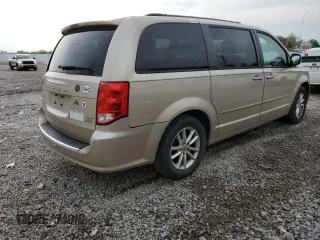2014 Dodge Grand Caravan SXT z VIN 2C4RDGCG1ER214411, wystawiony jako Copart lot #55497065 z przebiegiem 176 662 mil mil oraz Czysty tytuł • Clean title. Historia ofert i sprzedaży dostępna na DreamBid. Obrazek 3.
