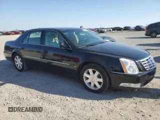 2008 Cadillac DTS 1SA z VIN 1G6KD57Y48U106139, wystawiony jako Copart lot #49046545 z przebiegiem 53 550 mil mil oraz Szkody całkowita. Historia ofert i sprzedaży dostępna na DreamBid. Obrazek 4.