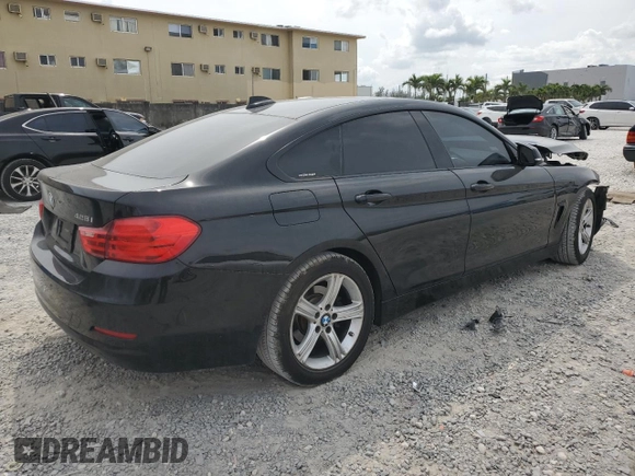 2015 BMW 4 Series 428i with VIN WBA4A5C55FG051557, listed as a Copart auction lot 47899115 with 91,292 mi miles and Salvage Title. Bid and sale history available at DreamBid. Image 3.