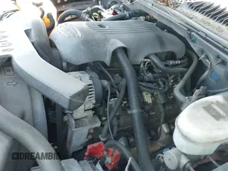 2003 Chevrolet Tahoe LT z VIN 1GNEC13Z13J280286, wystawiony jako IAAI lot #42010980 z przebiegiem Nie podano mil oraz . Historia ofert i sprzedaży dostępna na DreamBid. Obrazek 19.