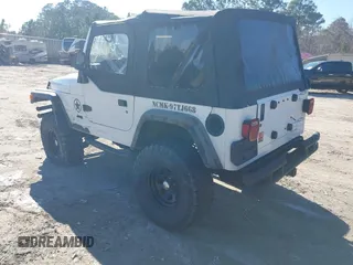 1997 Jeep Wrangler Sport with VIN 1J4FY19S7VP483735, listed as a IAAI auction lot 41469983 with 150,542 mi miles. Bid and sale history available at carsss.com. Image 3.
