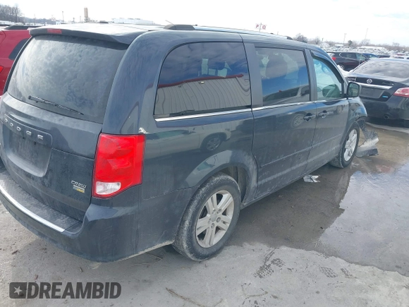 2013 Dodge Grand Caravan Crew with VIN 2C4RDGDG9DR740086, listed as a IAAI auction lot 41362852 with 145,881 mi miles and . Bid and sale history available at DreamBid. Image 4.