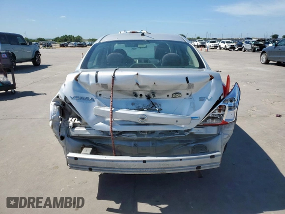 2012 Nissan Versa SV with VIN 3N1CN7AP3CL906673, listed as a Copart auction lot 62838455 with 249,517 mi miles and Salvage title. Bid and sale history available at DreamBid. Image 6.
