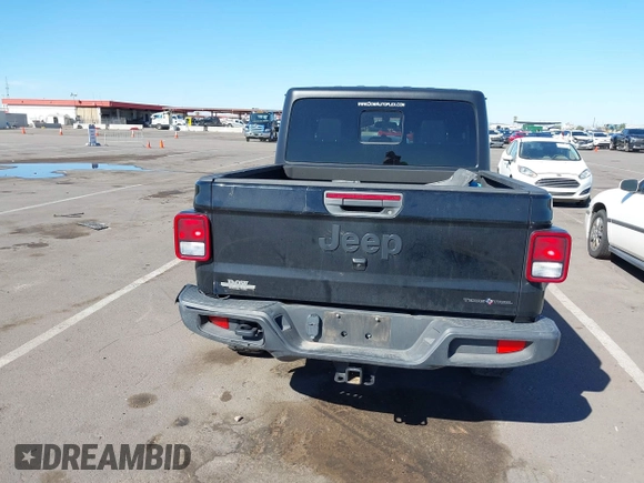 2022 Jeep Gladiator Texas Trail with VIN 1C6HJTAG7NL128584, listed as a IAAI auction lot 40630493 with Not Provided miles and . Bid and sale history available at DreamBid. Image 16.