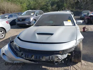 2021 Dodge Charger Scat Pack with VIN 2C3CDXGJ5MH539860, listed as a IAAI auction lot 41683146 with 21,361 mi miles and . Bid and sale history available at DreamBid. Image 6.