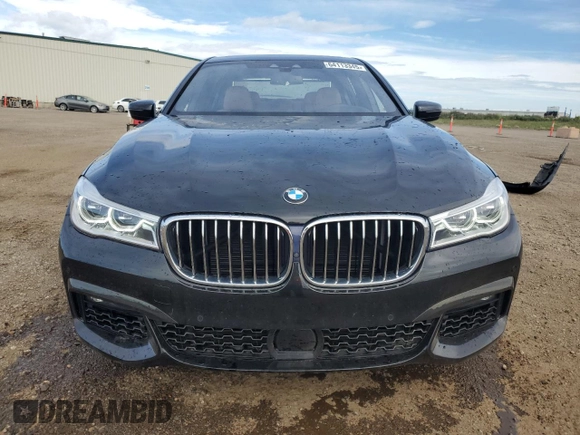 2019 BMW 7 Series 750i xDrive with VIN WBA7B0C53KG527537, listed as a Copart auction lot 64113345 with 36,820 mi miles and Salvage title. Bid and sale history available at DreamBid. Image 5.