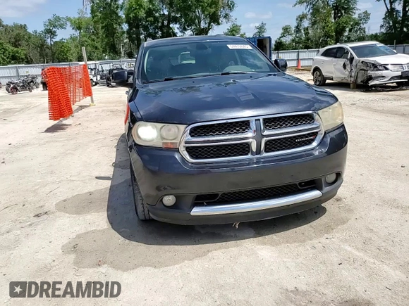 2013 Dodge Durango Crew with VIN 1C4SDHDT3DC679153, listed as a Copart auction lot 54472645 with 167,068 mi miles and Salvage Title. Bid and sale history available at DreamBid. Image 14.