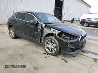 2019 BMW X2 xDrive28i with VIN WBXYJ5C56K5N77676, listed as a Copart auction lot 49628275 with 38,047 mi miles and Salvage Title. Bid and sale history available at carsss.com. Image 4.