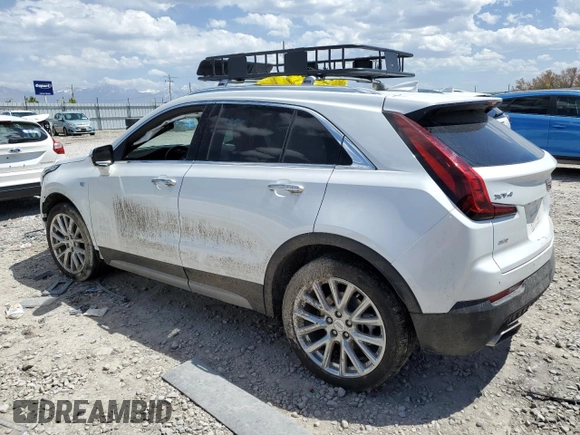 2023 Cadillac XT4 AWD Premium Luxury with VIN 1GYFZDR46PF130198, listed as a Copart auction lot 57763285 with 8,346 mi miles and Salvage title. Bid and sale history available at DreamBid. Image 2.
