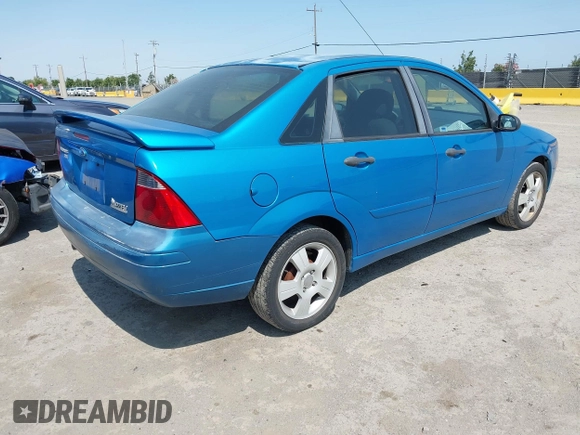 2007 Ford Focus S z VIN 1FAHP34N77W333895, wystawiony jako IAAI lot #42444411 z przebiegiem 155 522 mil mil oraz . Historia ofert i sprzedaży dostępna na DreamBid. Obrazek 4.