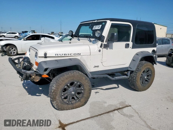 2004 Jeep Wrangler Rubicon z VIN 1J4FA69S34P757352, wystawiony jako Copart lot #52971745 z przebiegiem 139 855 mil mil oraz Szkoda całkowita • Salvage title. Historia ofert i sprzedaży dostępna na DreamBid. Obrazek 1.