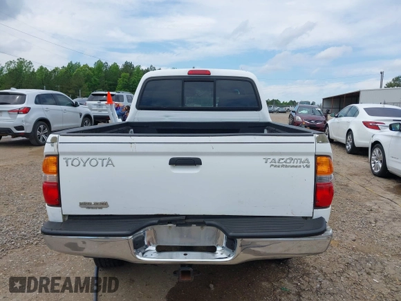 2001 Toyota Tacoma PreRunner z VIN 5TEGN92N11Z738985, wystawiony jako IAAI lot #42145856 z przebiegiem 385 673 mil mil oraz . Historia ofert i sprzedaży dostępna na DreamBid. Obrazek 18.