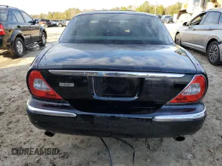 2007 Jaguar XJ with VIN SAJWA71B97SH18651, listed as a Copart auction lot 87690275 with 0 mi miles and Salvage Title. Bid and sale history available at carsss.com. Image 6.