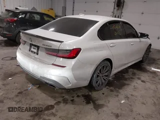 2020 BMW 3 Series M340i xDrive with VIN WBA5U9C08LFJ73063, listed as a IAAI auction lot 41513641 with 52,431 mi miles and . Bid and sale history available at DreamBid. Image 4.