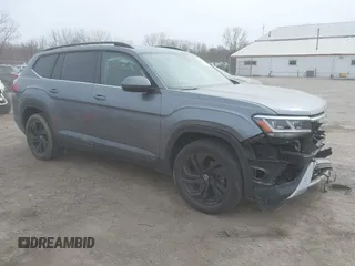 2021 Volkswagen Atlas SE z VIN 1V2KR2CA0MC570498, wystawiony jako IAAI lot #41807676 z przebiegiem 56 434 mil mil oraz . Historia ofert i sprzedaży dostępna na DreamBid. Obrazek 1.