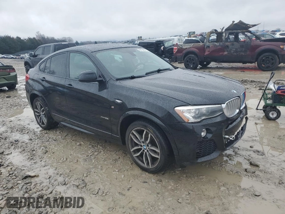 2015 BMW X4 xDrive28i with VIN 5UXXW3C57F0M87498, listed as a Copart auction lot 45154904 with 153,631 mi miles. Bid and sale history available at carsss.com. Image 4.
