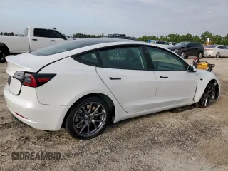 2023 Tesla Model 3 с VIN 5YJ3E1EA8PF418579, выставлен на аукционе Copart как лот 64472165 с пробегом 68 444 миль миль и Списание • Salvage title. История ставок и продаж доступна на DreamBid. Изображение 3.
