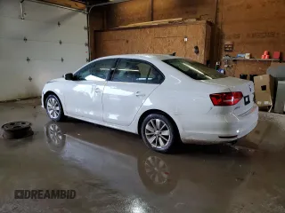 2015 Volkswagen Jetta SE with VIN 3VWD17AJ4FM308693, listed as a Copart auction lot 59987585 with 87,136 mi miles and Salvage title. Bid and sale history available at DreamBid. Image 2.