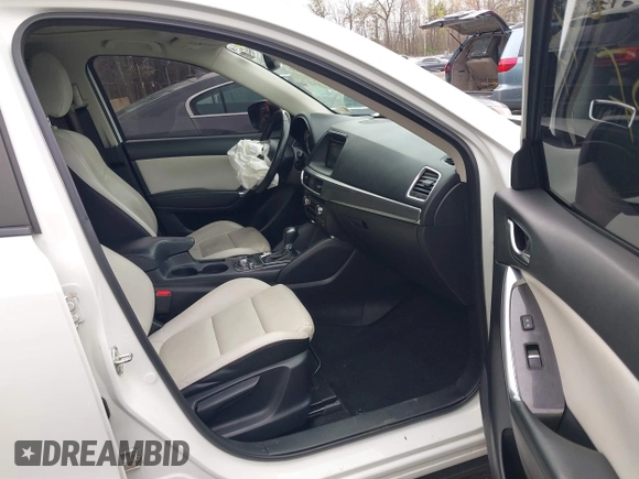 2016 Mazda CX-5 Grand Touring with VIN JM3KE4DY3G0838204, listed as a IAAI auction lot 41961049 with 98,918 mi miles and . Bid and sale history available at carsss.com. Image 5.