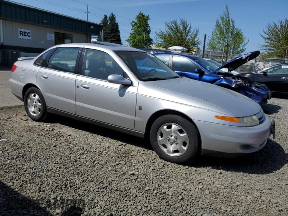 2002 Saturn LS z VIN 1G8JW54R92Y518857, wystawiony jako Copart lot #54855265 z przebiegiem 192 298 mil mil oraz Szkoda całkowita • Salvage title. Historia ofert i sprzedaży dostępna na DreamBid. Obrazek 4.