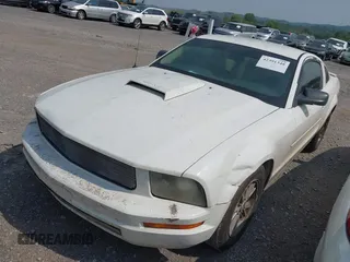 2007 Ford Mustang Deluxe with VIN 1ZVFT80N775312340, listed as a IAAI auction lot 42391348 with Not provided miles and . Bid and sale history available at DreamBid. Image 6.