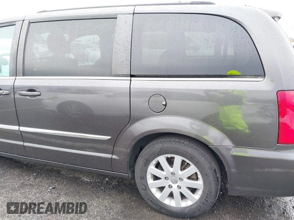 2015 Chrysler Town & Country Touring with VIN 2C4RC1BG9FR720782, listed as a IAAI auction lot 41765488 with 129,889 mi miles and . Bid and sale history available at DreamBid. Image 14.