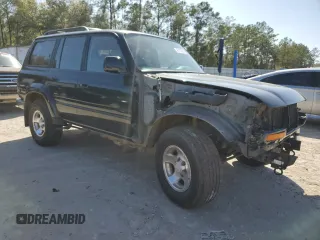 1995 Toyota Land Cruiser z VIN JT3DJ81W6S0106332, wystawiony jako Copart lot #47772055 z przebiegiem 214 499 mil mil oraz Szkoda całkowita • Salvage title. Historia ofert i sprzedaży dostępna na DreamBid. Obrazek 4.