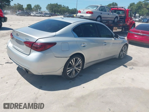 2018 Infiniti Q50 Luxe with VIN JN1EV7AP7JM358611, listed as a IAAI auction lot 42579521 with 102,922 mi miles and . Bid and sale history available at DreamBid. Image 4.