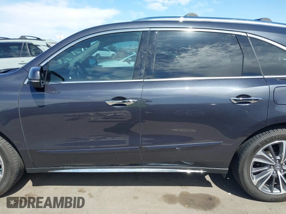 2019 Acura MDX Technology with VIN 5J8YD4H5XKL029023, listed as a IAAI auction lot 42108214 with 73,535 mi miles and . Bid and sale history available at DreamBid. Image 14.