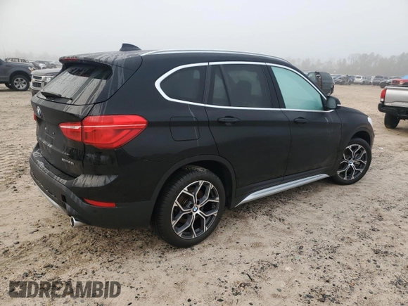 2021 BMW X1 xDrive28i with VIN WBXJG9C07M5T06155, listed as a Copart auction lot 84222754 with 18,466 mi miles and Salvage Title. Bid and sale history available at carsss.com. Image 3.