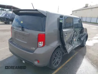 2014 Scion xB with VIN JTLZE4FE7EJ065646, listed as a IAAI auction lot 41681896 with 149,534 mi miles. Bid and sale history available at carsss.com. Image 4.