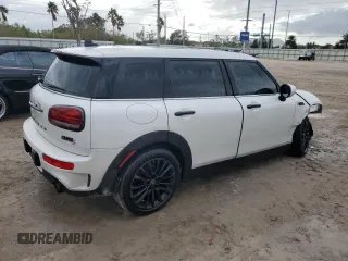 2023 MINI Clubman Cooper S with VIN WMWLV7C04P2T75971, listed as a Copart auction lot 79020444 with 23,521 mi miles and Salvage Title. Bid and sale history available at carsss.com. Image 3.