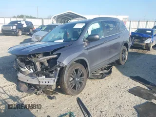 2022 Honda Pilot Special Edition with VIN 5FNYF5H27NB032330, listed as a IAAI auction lot 41522565 with Not Provided miles and . Bid and sale history available at carsss.com. Image 16.