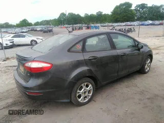 2015 Ford Fiesta SE with VIN 3FADP4BJ8FM178485, listed as a IAAI auction lot 42095511 with 151,064 mi miles. Bid and sale history available at carsss.com. Image 4.