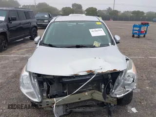 2015 Nissan Versa S Plus with VIN 3N1CN7AP0FL810844, listed as a IAAI auction lot 41386594 with 118,606 mi miles. Bid and sale history available at carsss.com. Image 6.