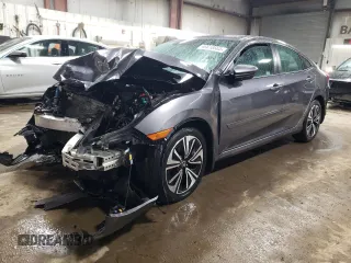 2018 Honda Civic EX-T with VIN 19XFC1F42JE000270, listed as a Copart auction lot 46618665 with 54,321 mi miles and Salvage title. Bid and sale history available at DreamBid. Image 1.