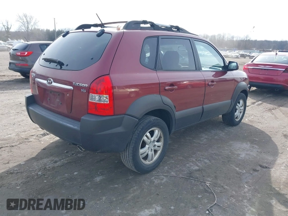 2007 Hyundai Tucson SE with VIN KM8JN12D57U591744, listed as a IAAI auction lot 41511882 with 259,397 mi miles. Bid and sale history available at carsss.com. Image 4.