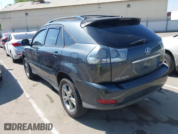 2006 Lexus RX 400h with VIN JTJHW31U560009707, listed as a IAAI auction lot 42148672 with 198,569 mi miles and . Bid and sale history available at DreamBid. Image 3.
