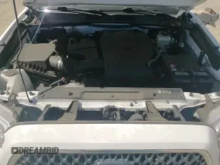 2019 Toyota Tacoma SR5 с VIN 3TMDZ5BN6KM058580, выставлен на аукционе Copart как лот 65633265 с пробегом 30 232 миль миль и Списание • Salvage title. История ставок и продаж доступна на DreamBid. Изображение 14.