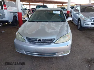 2003 Toyota Camry LE with VIN JTDBE32K730176610, listed as a IAAI auction lot 41627010 with 238,502 mi miles and . Bid and sale history available at DreamBid. Image 6.
