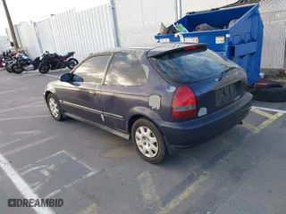 1999 Honda Civic DX with VIN 2HGEJ6446XH111050, listed as a IAAI auction lot 39525349 with 96,566 mi miles. Bid and sale history available at carsss.com. Image 3.