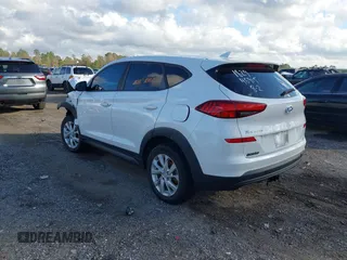 2019 Hyundai Tucson SE with VIN KM8J2CA48KU951829, listed as a IAAI auction lot 41261166 with 100,533 mi miles. Bid and sale history available at carsss.com. Image 3.