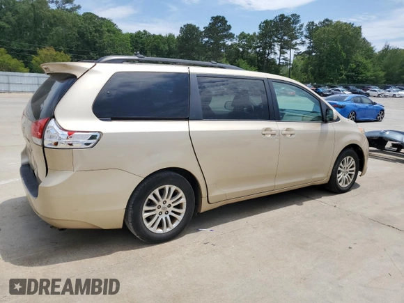 2012 Toyota Sienna XLE AAS with VIN 5TDYK3DC1CS277339, listed as a Copart auction lot 57494715 with 240,666 mi miles and Salvage title. Bid and sale history available at DreamBid. Image 3.