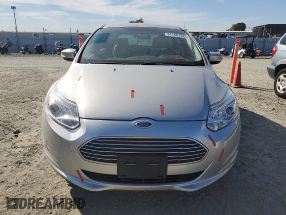 2014 Ford Focus Electric with VIN 1FADP3R45EL287285, listed as a Copart auction lot 74148154 with 64,543 mi miles and Salvage title. Bid and sale history available at DreamBid. Image 5.