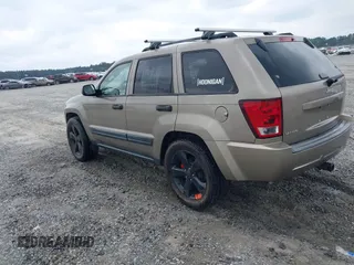 2006 Jeep Grand Cherokee Laredo with VIN 1J4HS48N56C111651, listed as a IAAI auction lot 42048777 with 224,866 mi miles. Bid and sale history available at carsss.com. Image 3.