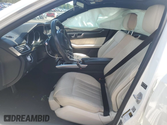 2016 Mercedes-Benz E-Class E 400 with VIN WDDHF6HB4GB182560, listed as a Copart auction lot 54133114 with 67,926 mi miles and Salvage Title. Bid and sale history available at carsss.com. Image 7.