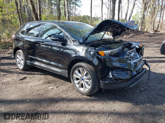 2022 Ford Edge Titanium with VIN 2FMPK4K95NBB06151, listed as a IAAI auction lot 41932545 with 57,762 mi miles and . Bid and sale history available at DreamBid. Image 1.